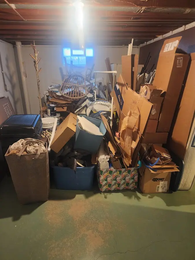 Roll-off dumpster container at job site for 2 Yard Dumpster Rental in Cortland